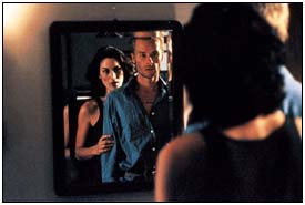 [actors Carrie-Anne Moss & Guy Pearse, in Memento]